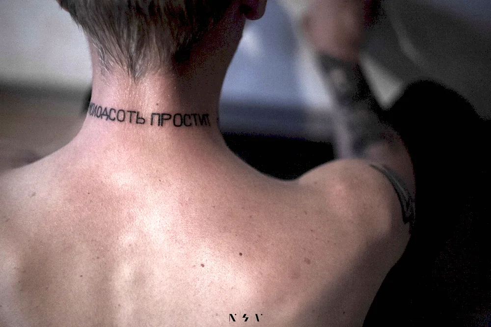 Neck tattoo on the back of the neck