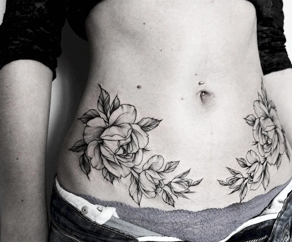 Tattoo on abdomen for girls