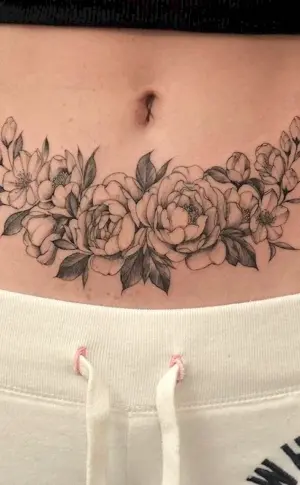 Belly tattoos on the abdomen