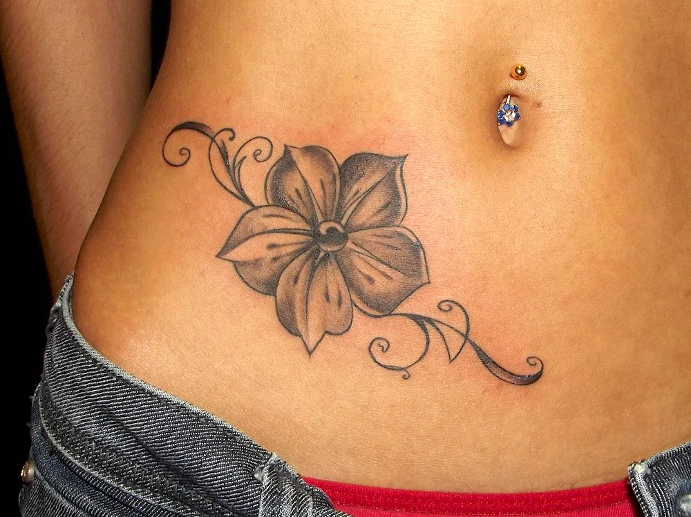 Belly tattoos on the abdomen. belly tattoo for girls