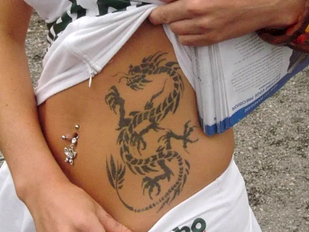 Tattoo on abdomen men's numbers