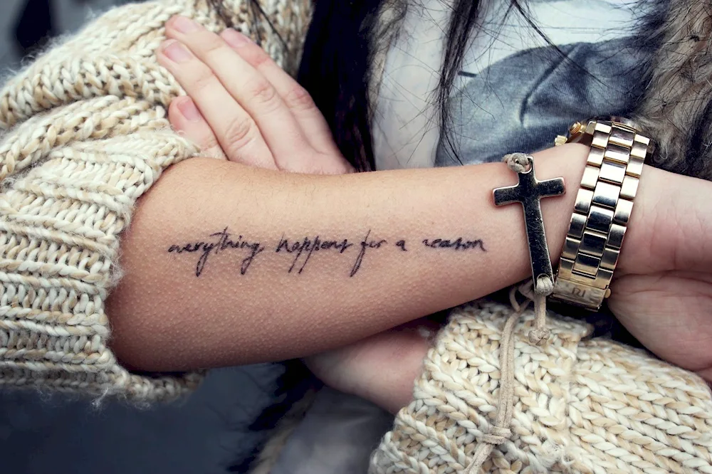 Tattoo lettering on arm