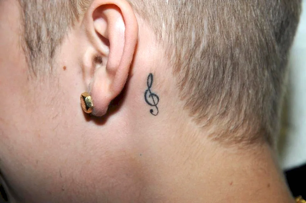 Tattoo behind the ear