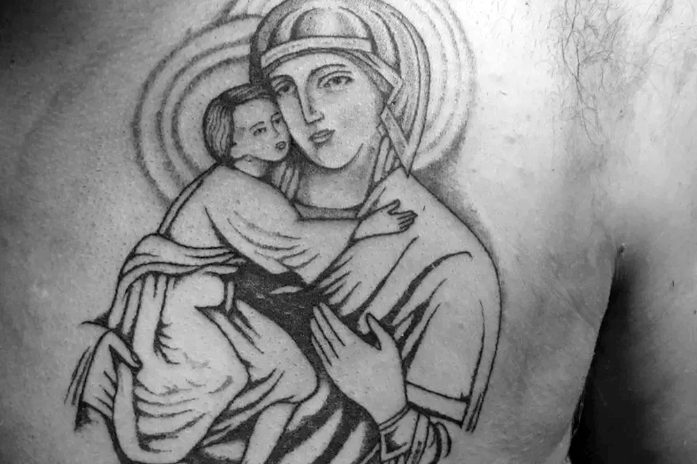 Our Lady of the Virgin Mary tattoo