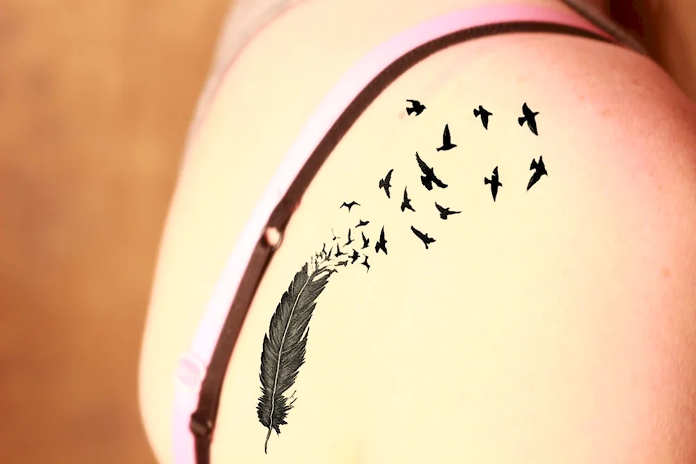 Bird tattoos for girls on the arm