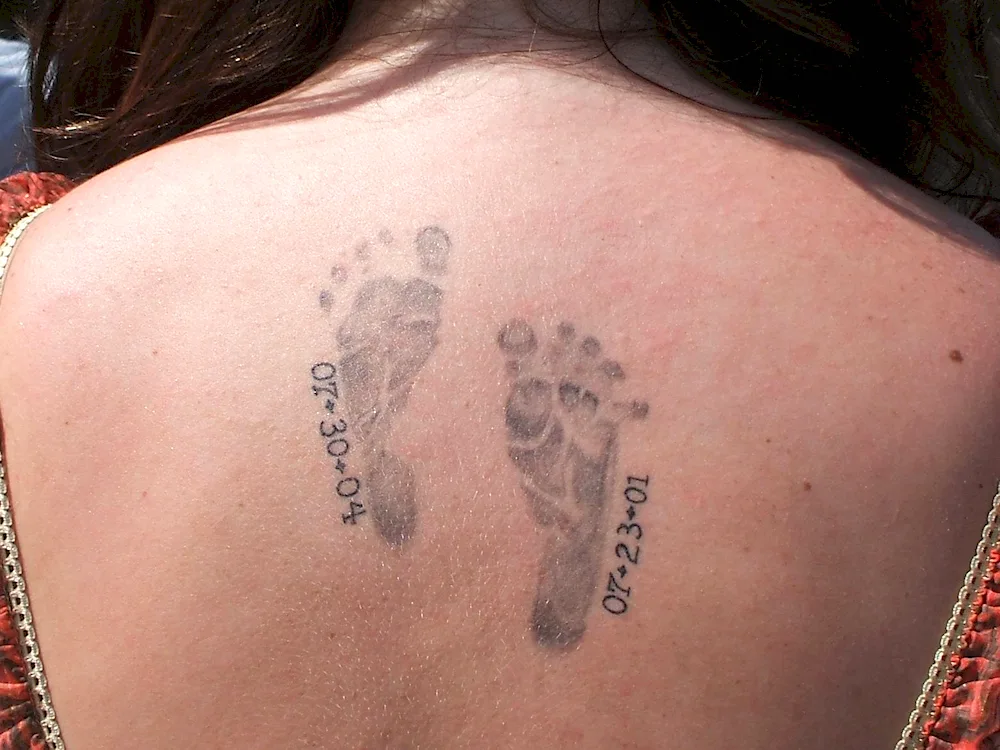 Father's tattoos in honour of son