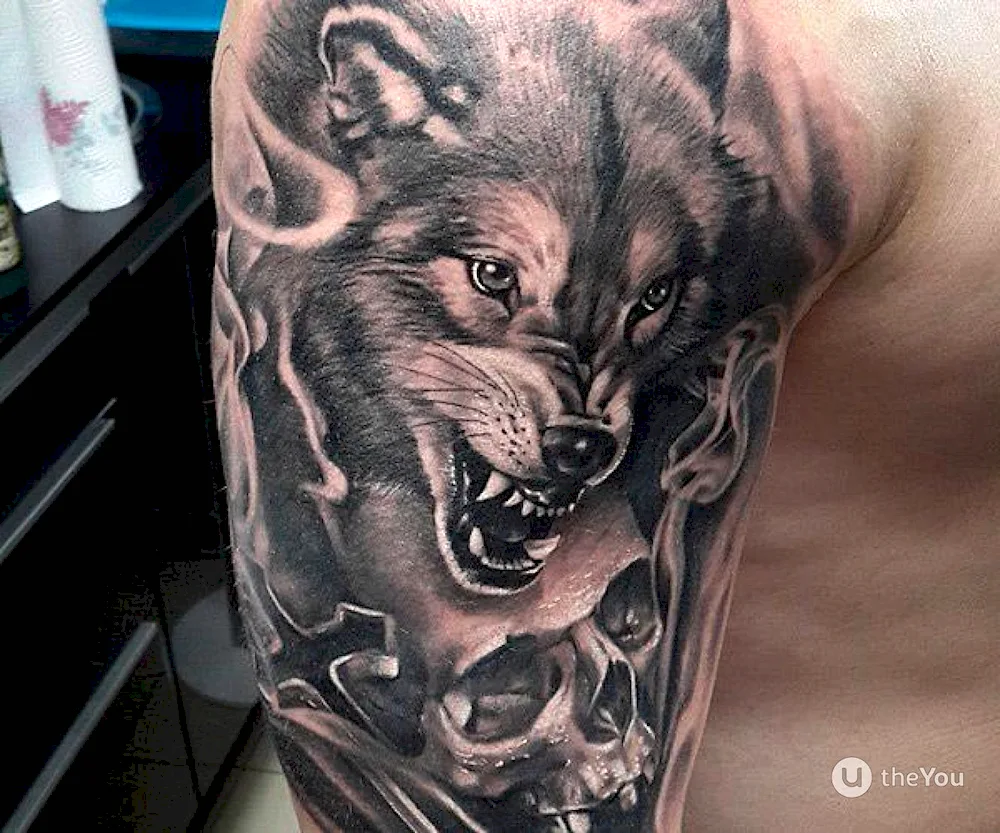 Wolf Wolf tattoo on shoulder