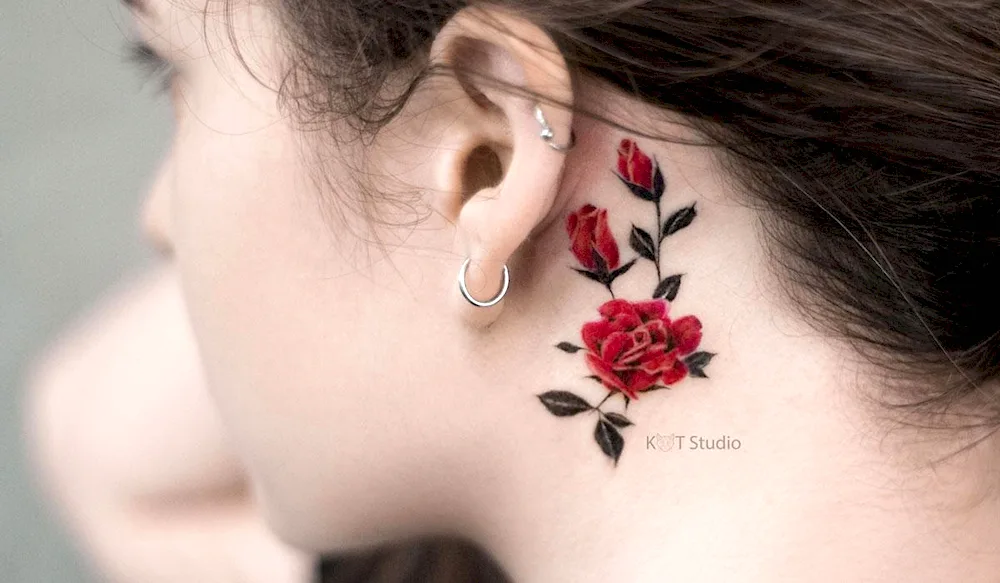 Girl ear tattoo