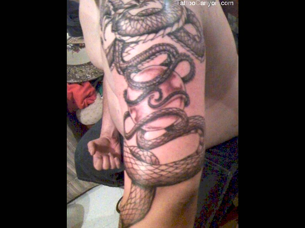 Snake tattoo on arm