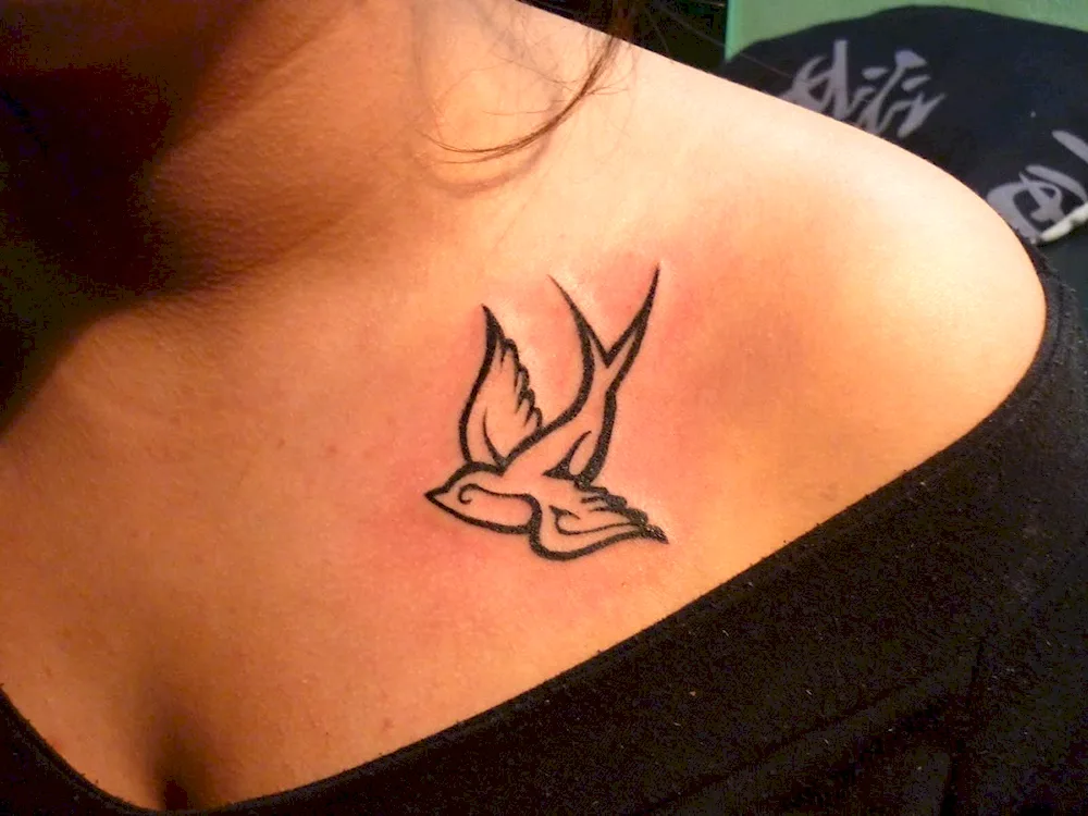 Clavicle tattoo