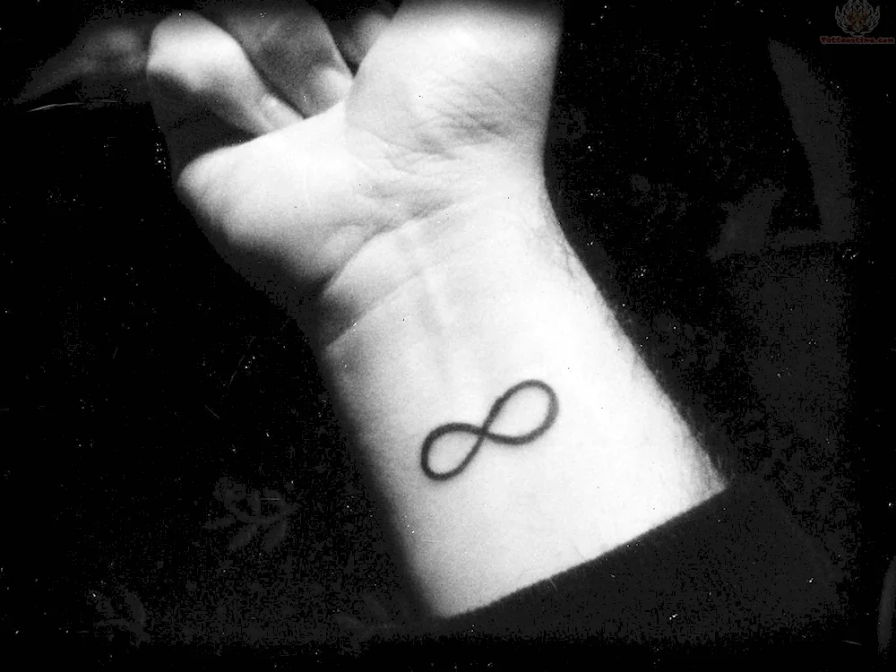 Infinity tattoo with a feather