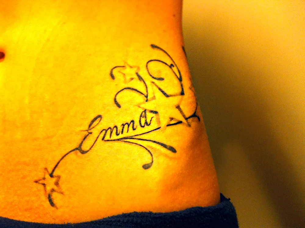 Name tattoo with inscriptions