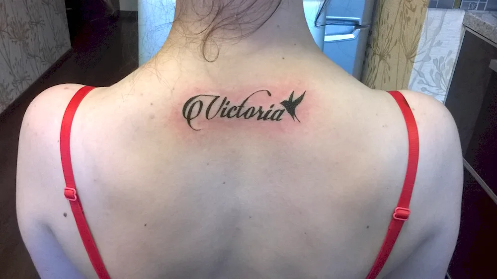 Victoria tattoo with name Victoria