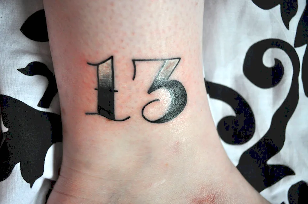 Number 13 tattoo