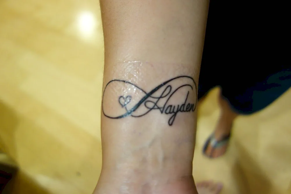 Tattoo with name Nikita