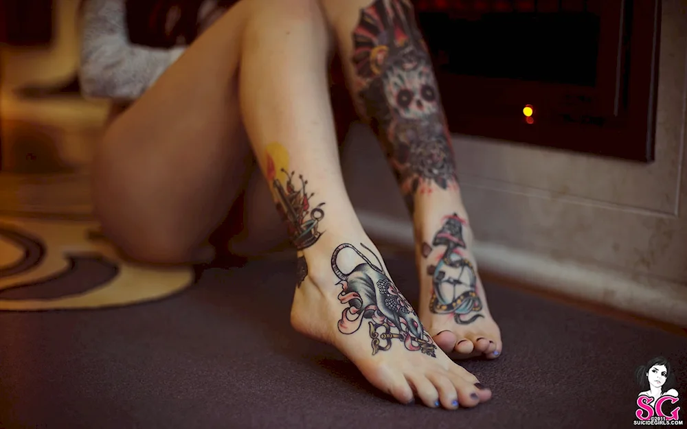 Female leg tattoos