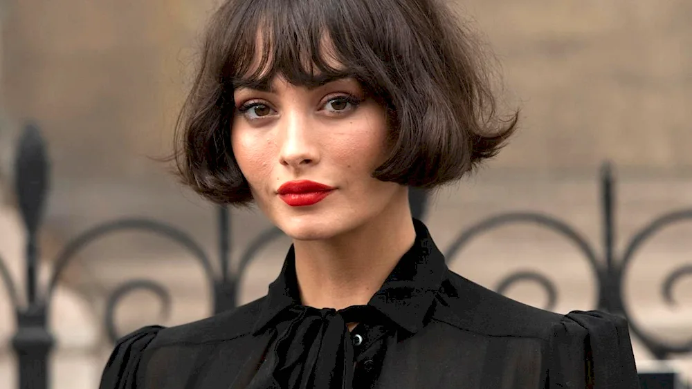 Sheryl Cole with bangs