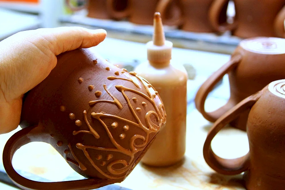 Crafting clay on the potter's wheel