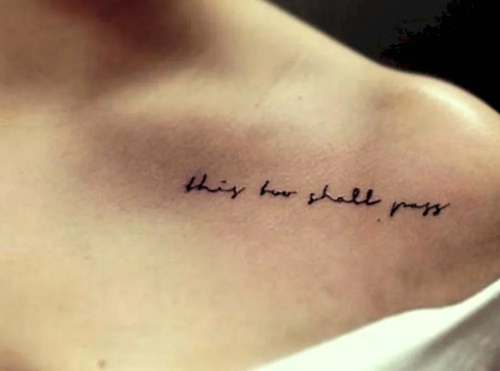 Tattoo on collarbone in Latin