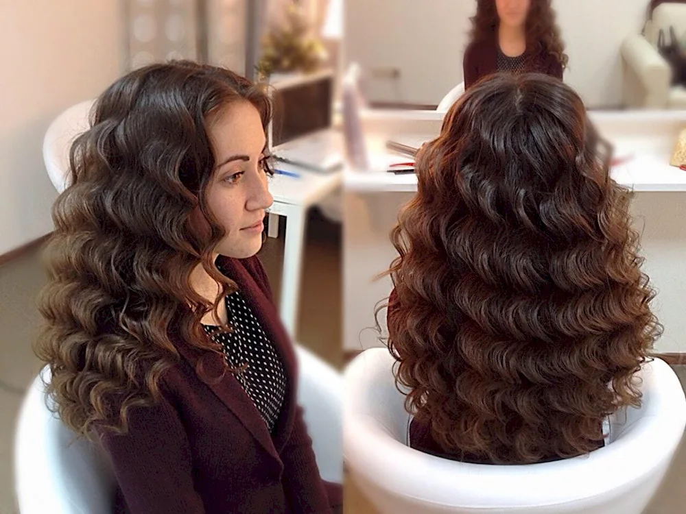 Curls on a curling iron for long hair