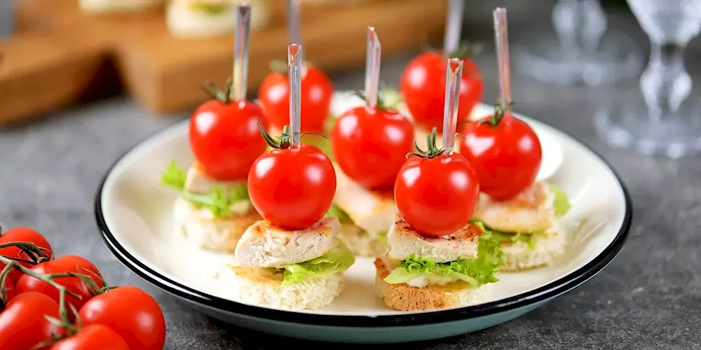 Canape mozzarella with cherry