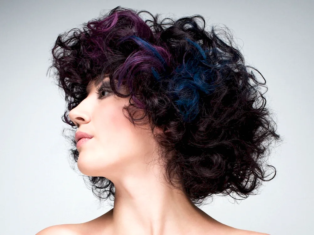 Coloured strands on curly hair