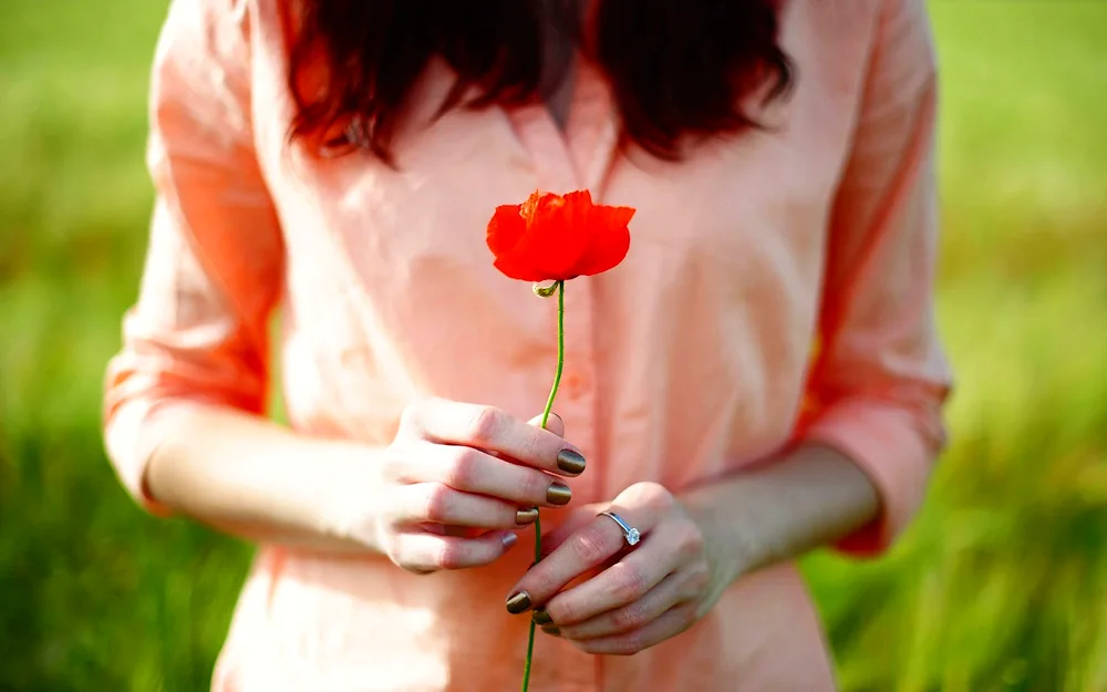 Flower in hand.