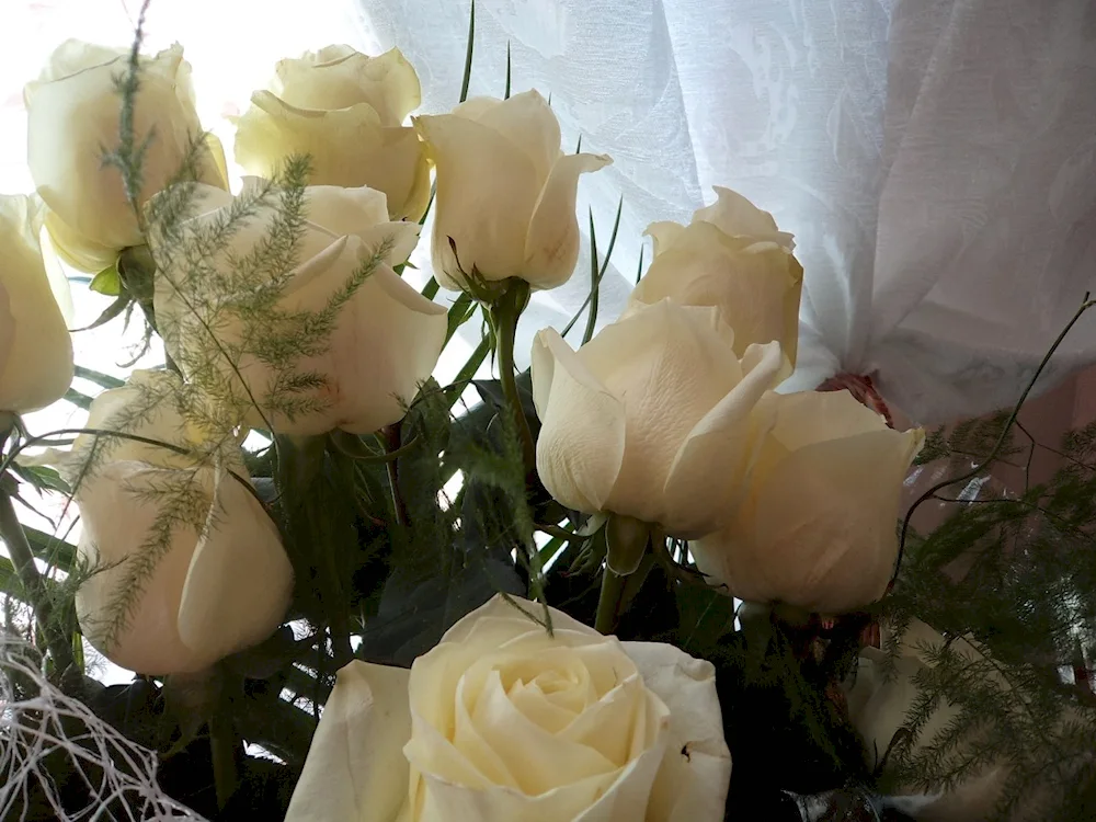 A beautiful bouquet of flowers in a vase at home