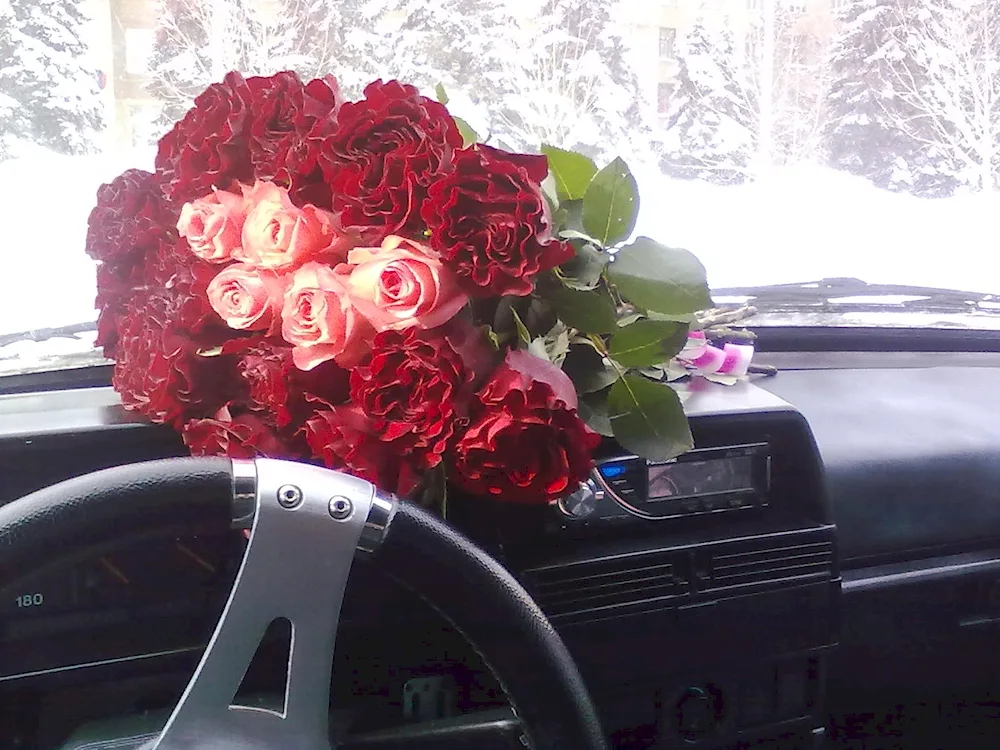 Bouquet of flowers in the car