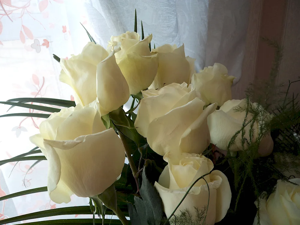 Bouquet of flowers on the windowsill