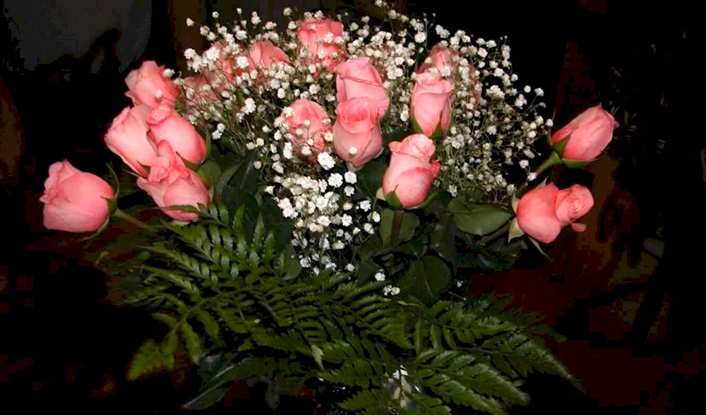 A bouquet of flowers on the bed