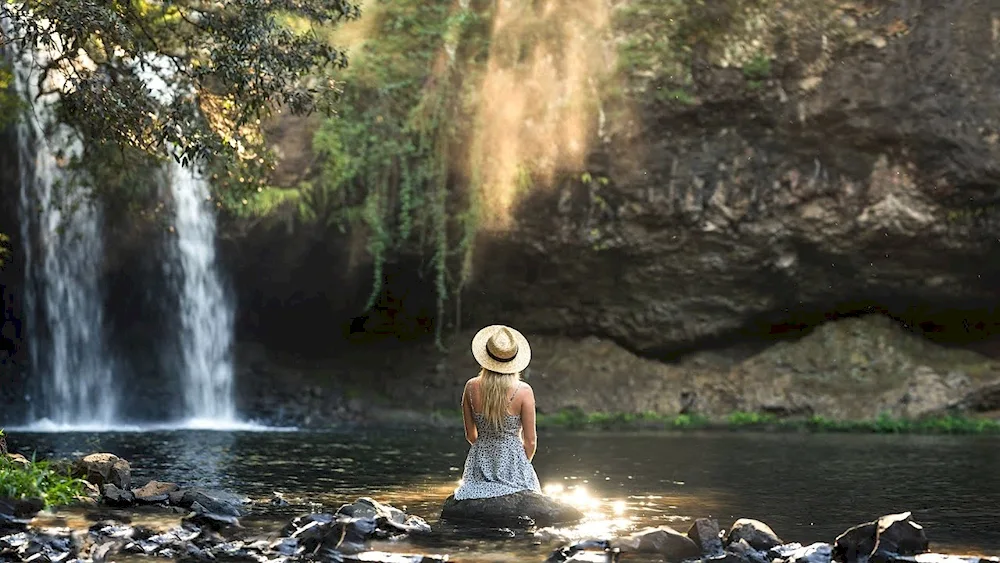 Waterfall girl at the waterfall