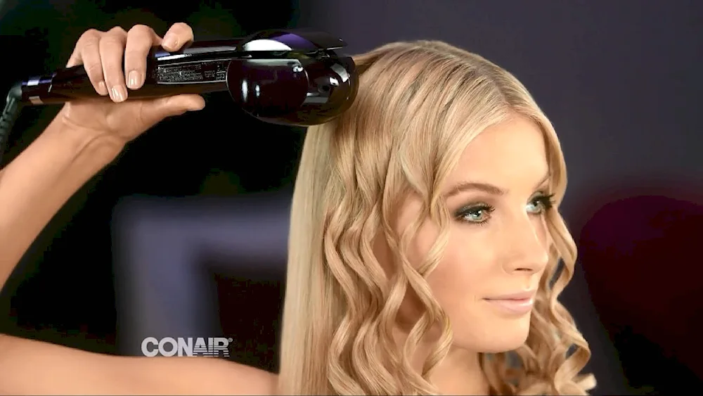 Hair curls on a triple curling iron