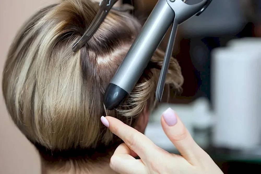 Short hair curls with a flat iron