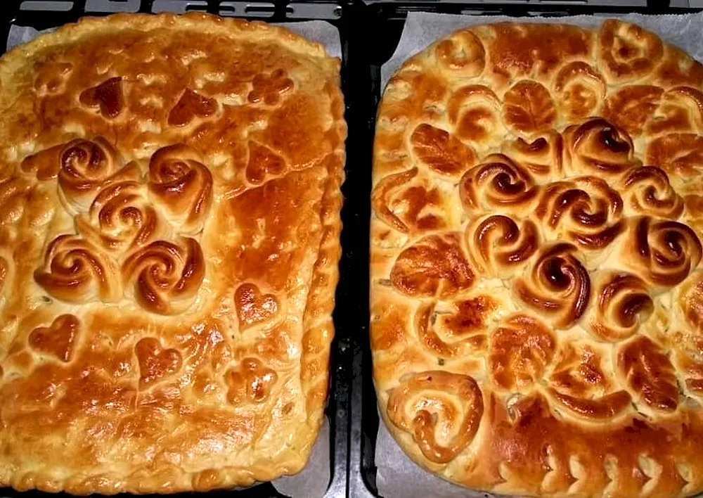 Decorating a yeast dough pie with cabbage