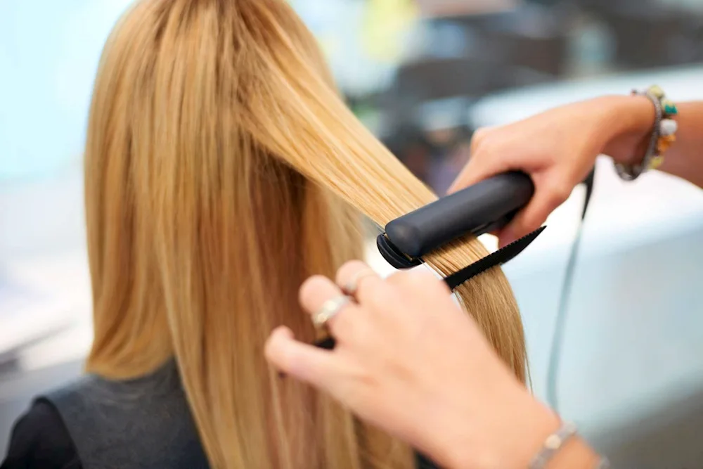 Locks with tongs. Straightening curls with a flat iron