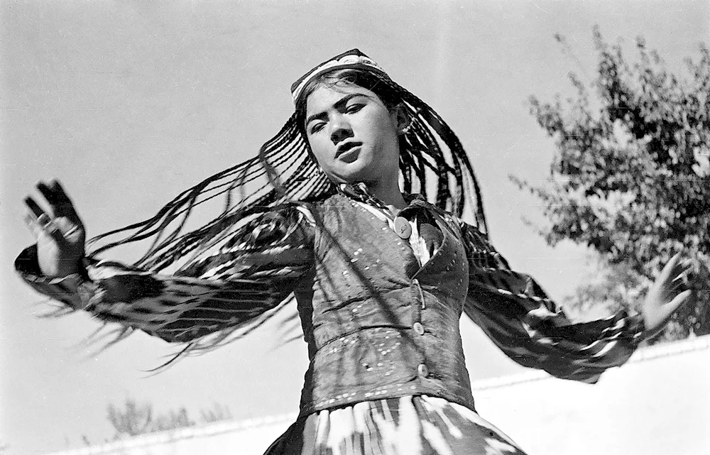 Uzbek girl with pigtails