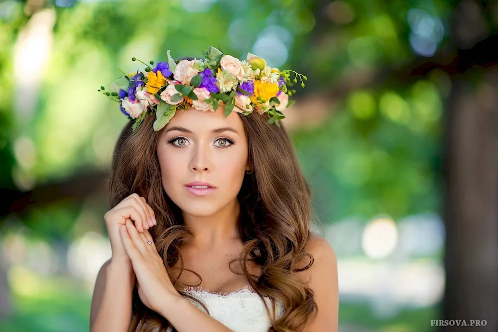 Girl with wreath of flowers