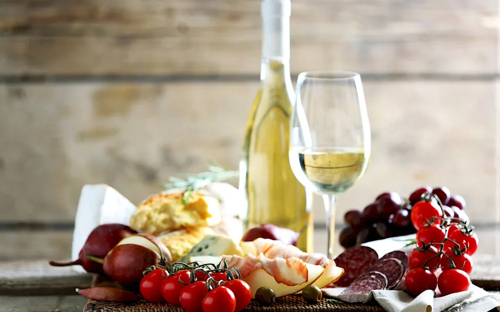 Wine and cheese still life
