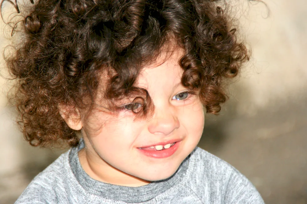Curly girl boy's