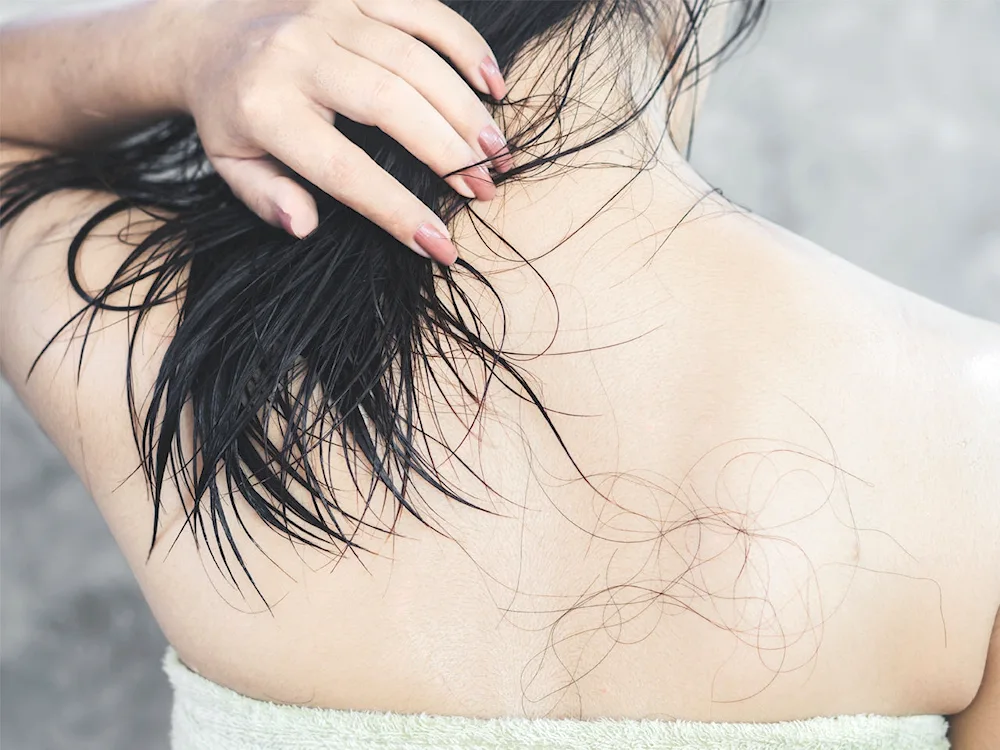 Girl's back hair from behind women