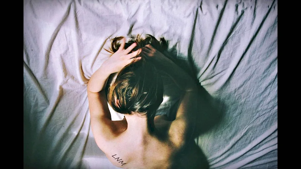 Behind the girl's hair