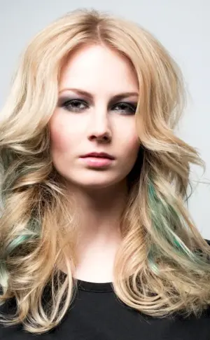 Green strands on blonde hair