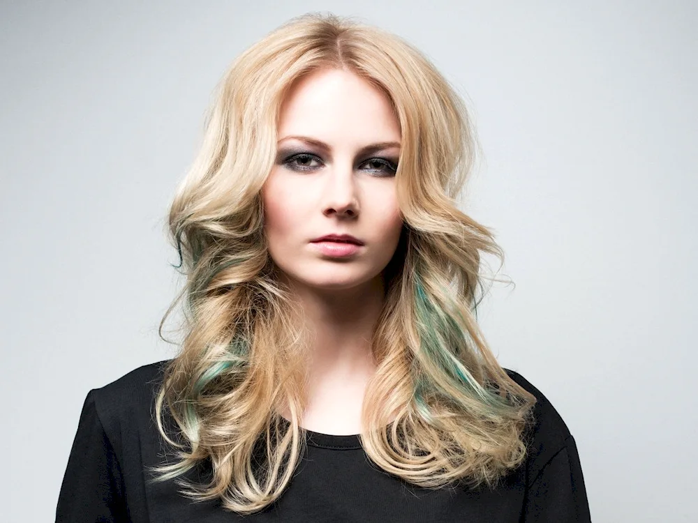 Green strands on blonde hair