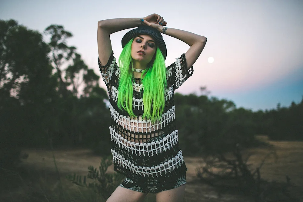 Kelsey James with green hair