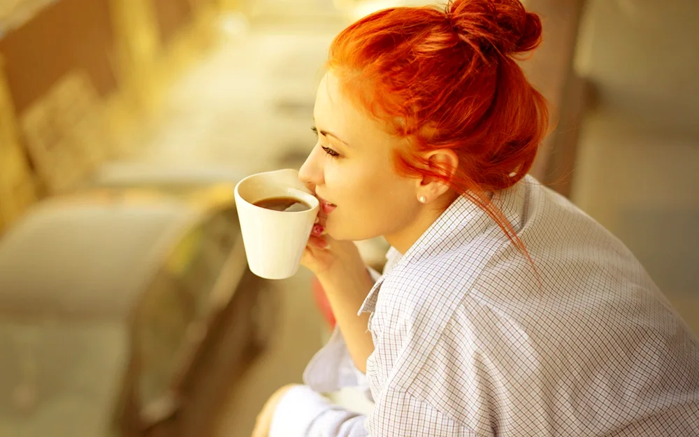 Woman with a cup of coffee