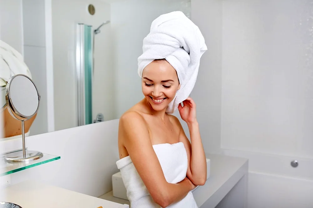 Woman with towel on her head