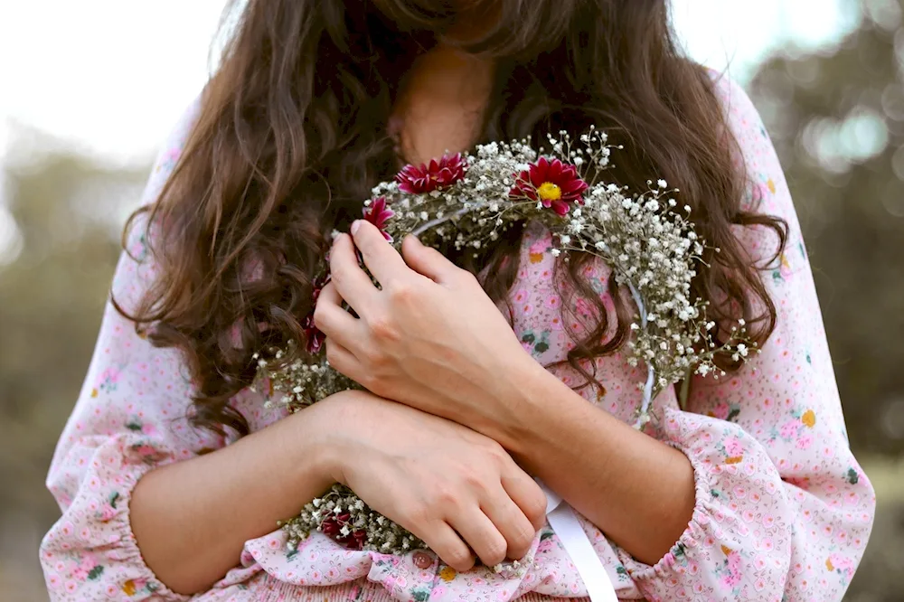 Girl with flowers in her hand