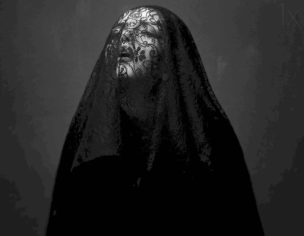 Woman in black veil