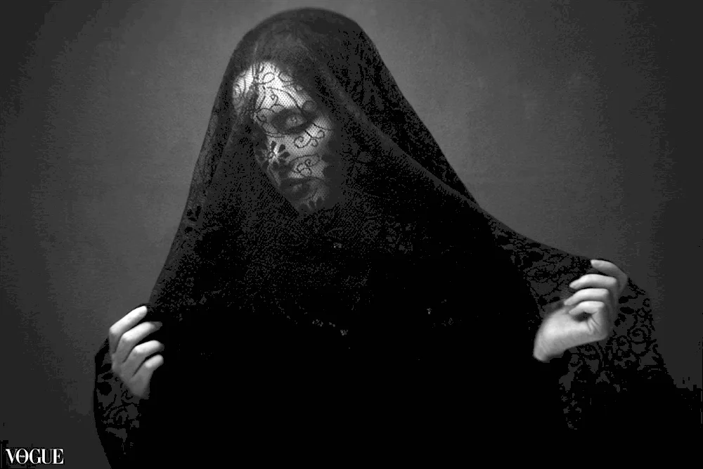 Woman in black veil